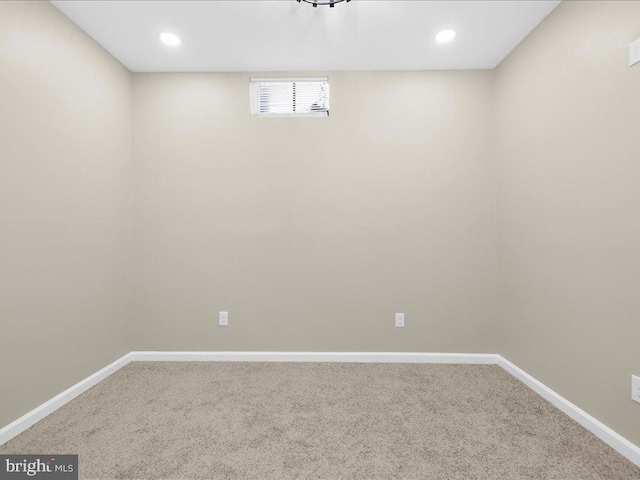 basement featuring carpet flooring