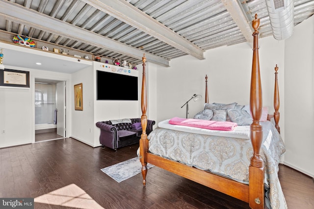 bedroom with dark wood-type flooring and beamed ceiling