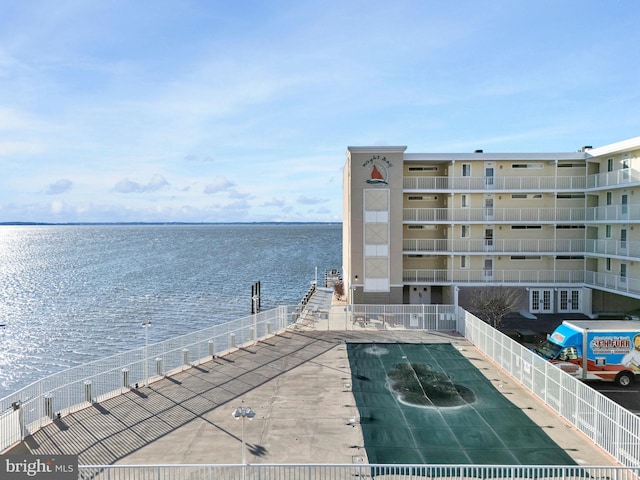 view of water feature featuring fence