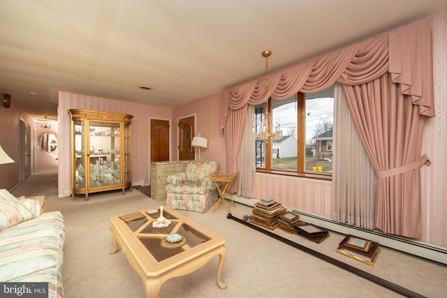 carpeted living room with a baseboard radiator