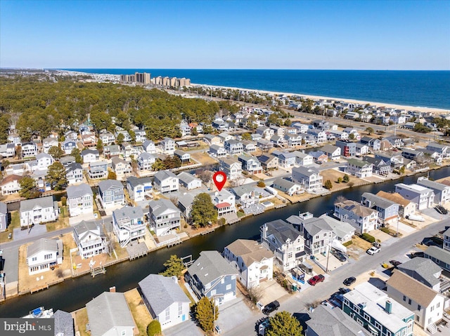 aerial view featuring a residential view and a water view