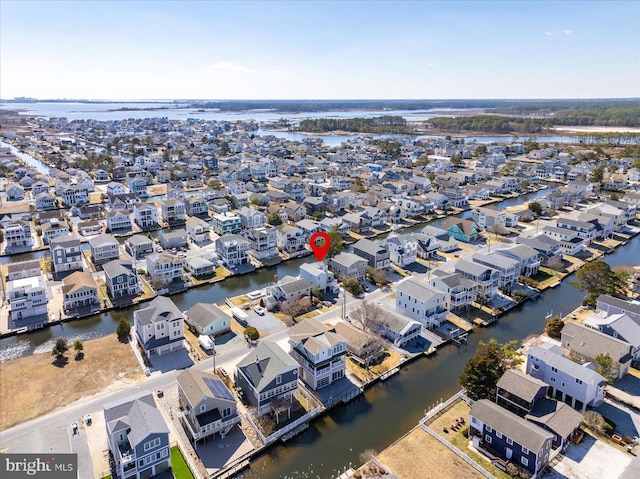 aerial view with a residential view and a water view