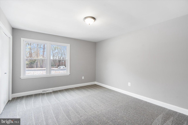 view of carpeted spare room