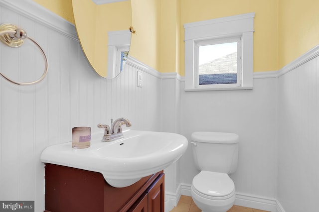 bathroom featuring toilet and vanity