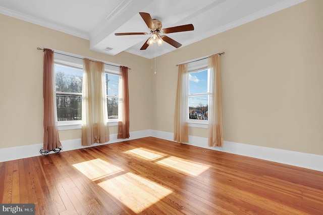 spare room with ceiling fan, light hardwood / wood-style flooring, and crown molding