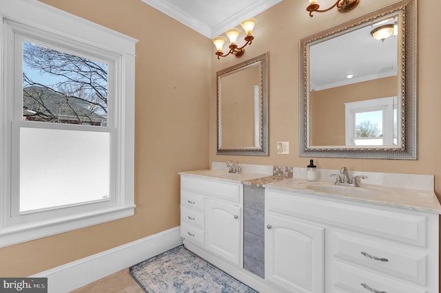 bathroom with ornamental molding, vanity, and tile patterned flooring