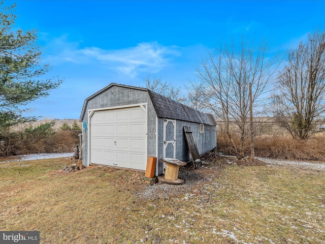 garage with a lawn