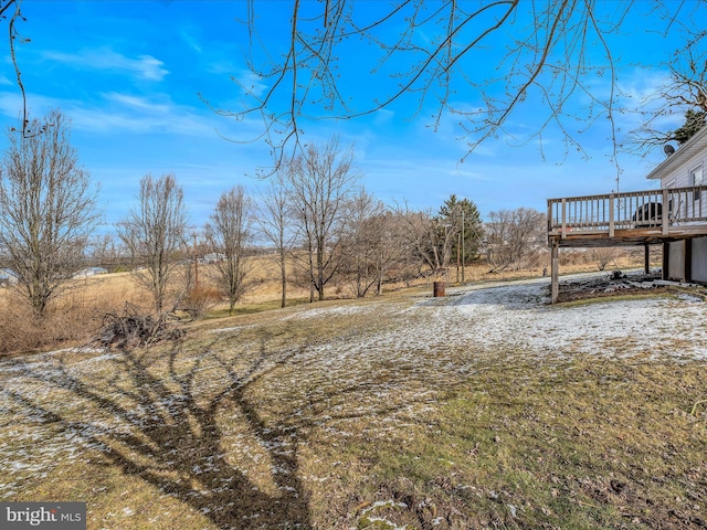 view of yard with a deck