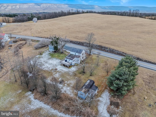 bird's eye view featuring a mountain view and a rural view