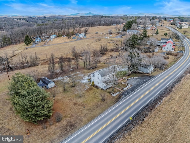 aerial view featuring a mountain view and a rural view