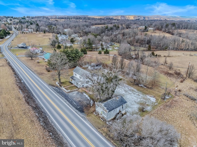 drone / aerial view featuring a mountain view