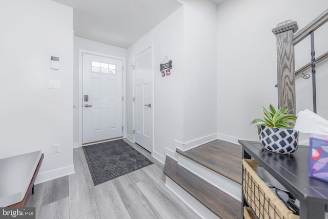 foyer entrance featuring light hardwood / wood-style flooring