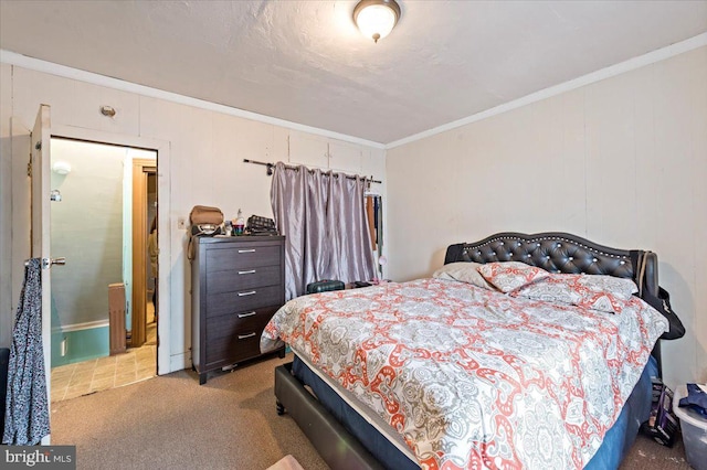 bedroom with ornamental molding and light carpet
