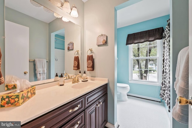11919 Berrybrook Ter, Upper Marlboro, MD 20772 - bathroom featuring vanity, toilet, baseboards, and a shower with curtain