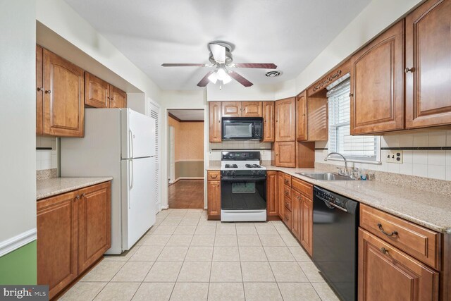 11919 Berrybrook Ter, Upper Marlboro, MD 20772 - kitchen with black appliances, a sink, ceiling fan, decorative backsplash, and brown cabinets