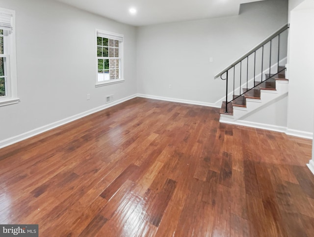 interior space with dark hardwood / wood-style floors