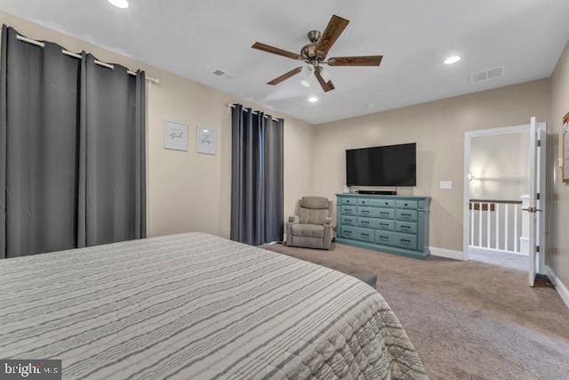 carpeted bedroom featuring ceiling fan