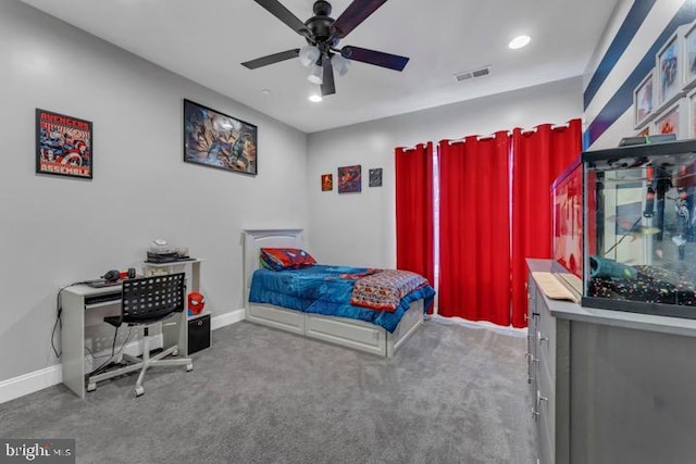 carpeted bedroom with ceiling fan