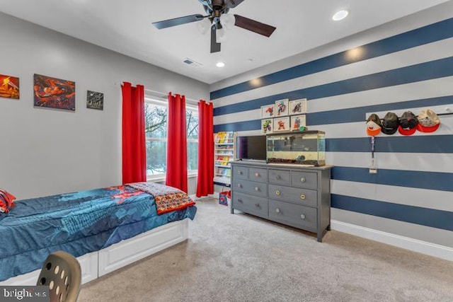 bedroom with light carpet and ceiling fan