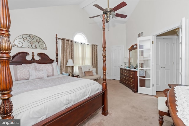 bedroom with beam ceiling, ceiling fan, light carpet, and high vaulted ceiling