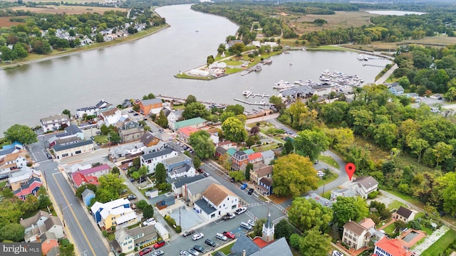 drone / aerial view with a water view