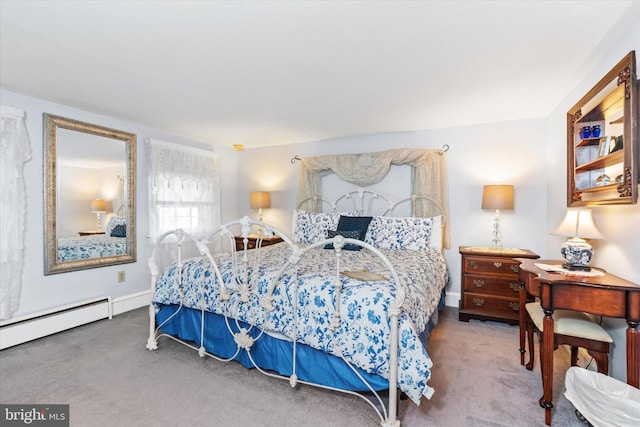 bedroom featuring a baseboard radiator and carpet