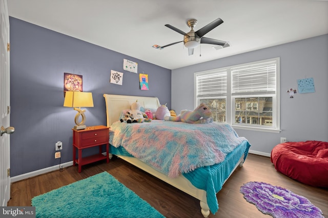 bedroom featuring dark wood-type flooring and ceiling fan