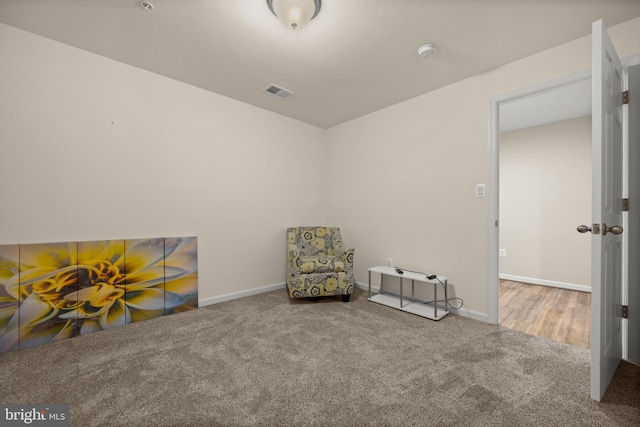 unfurnished room with carpet flooring