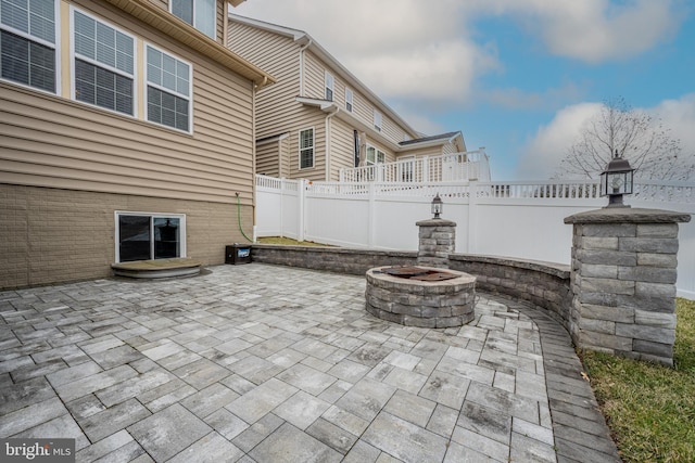 view of patio featuring a fire pit