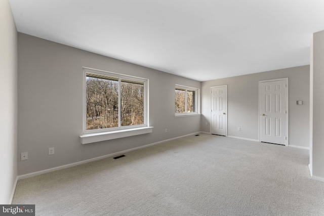 view of carpeted spare room