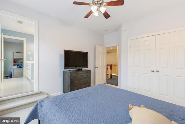 bedroom with visible vents, baseboards, a ceiling fan, carpet flooring, and a closet