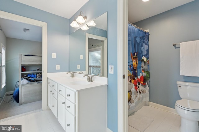 full bath with double vanity, visible vents, toilet, a sink, and baseboards