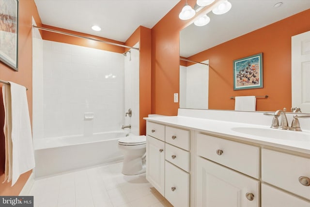 bathroom with tub / shower combination, vanity, and toilet