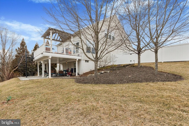 view of yard featuring a patio area, fence, and a wooden deck