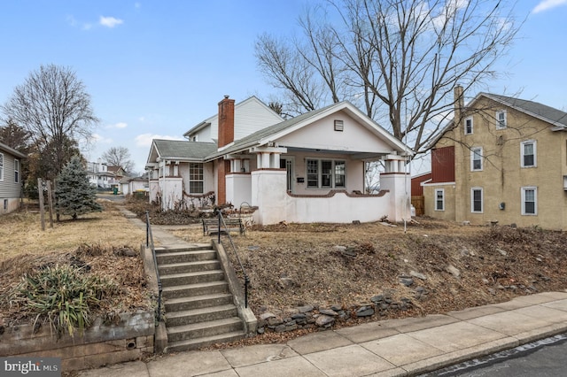 bungalow-style house with covered porch