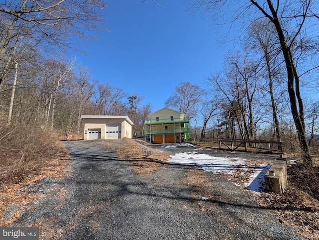 view of front of property with an outbuilding and a garage