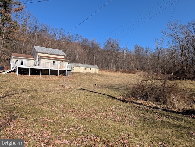 view of yard featuring a deck