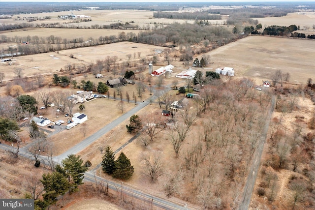 birds eye view of property featuring a rural view