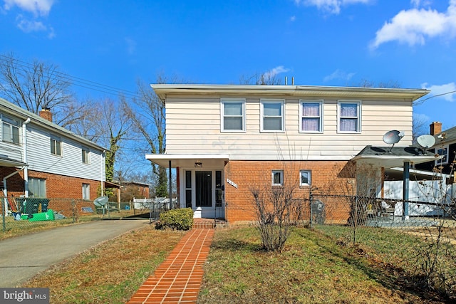 back of house with a yard