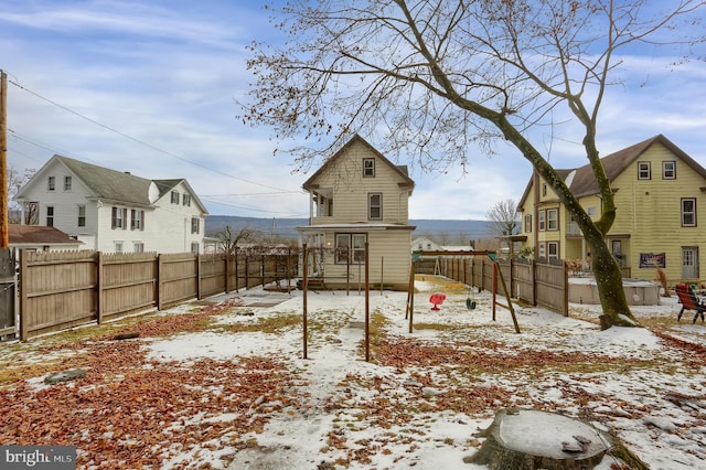 view of yard covered in snow