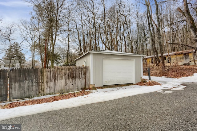 view of snow covered garage