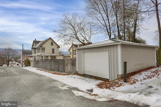 view of snow covered garage