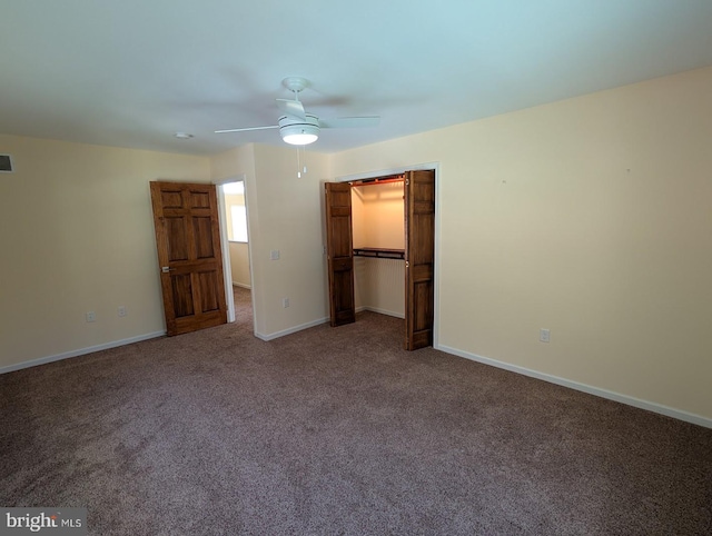 unfurnished bedroom with carpet floors, a closet, and ceiling fan