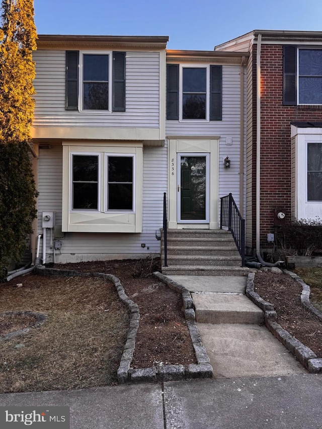 view of property featuring entry steps