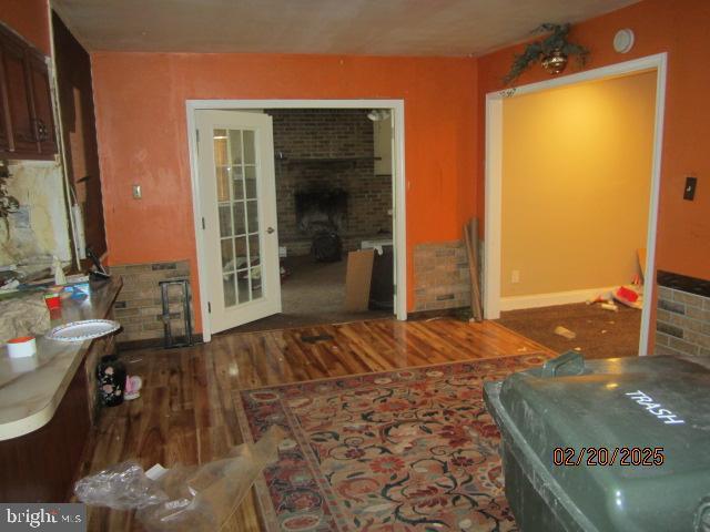 living area with dark wood-style flooring