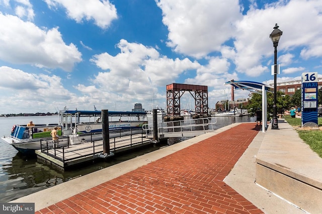 view of dock featuring a water view and boat lift