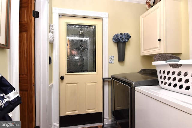 laundry area with cabinet space and washer and dryer