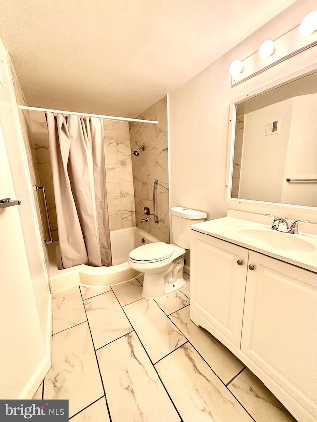 bathroom featuring vanity, toilet, and curtained shower