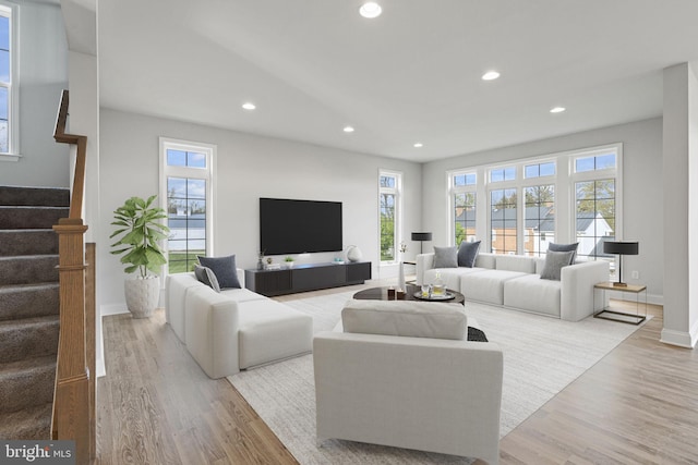 living room with light hardwood / wood-style flooring