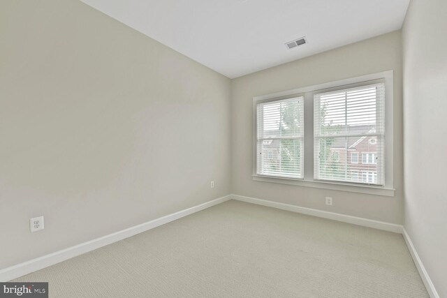 20765 Duxbury Ter, Ashburn, VA 20147 - spare room featuring baseboards and light colored carpet